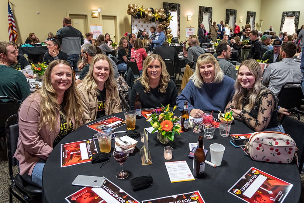 Cancer-Crush-Table Ladies at a table at the Cancer Crush event